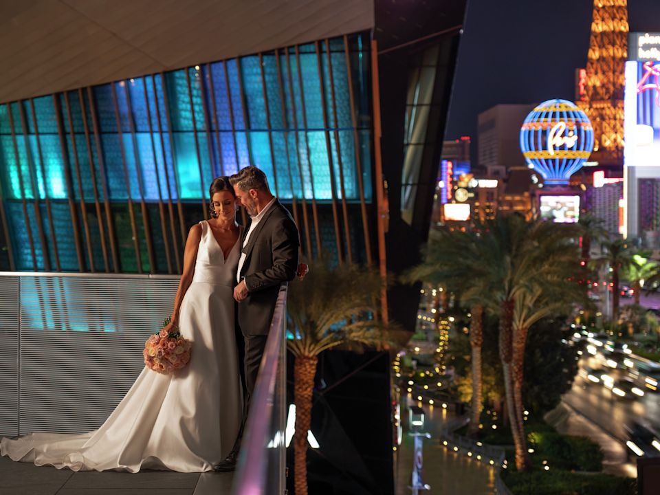 Couple on the Ballroom Balcony Overlooking the Las Vegas Strip