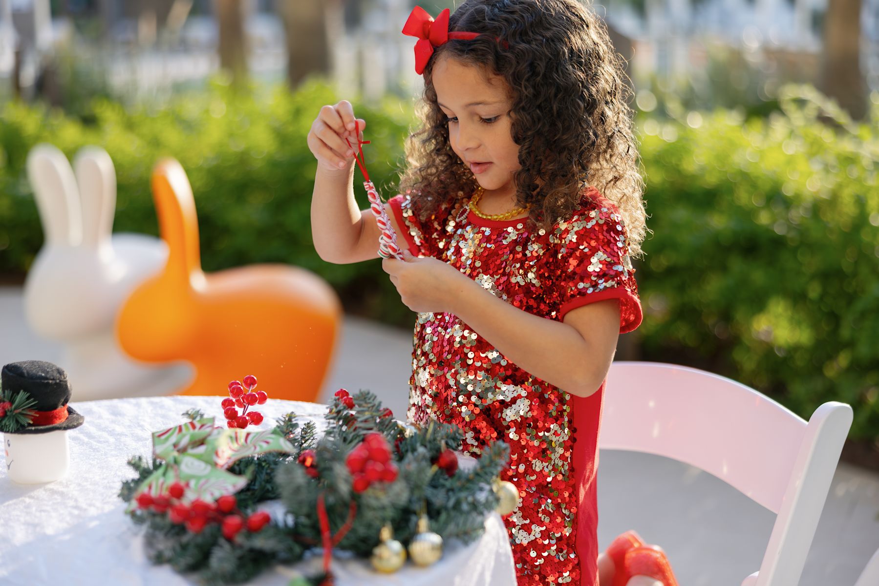 Girl Decorating for the Holidays