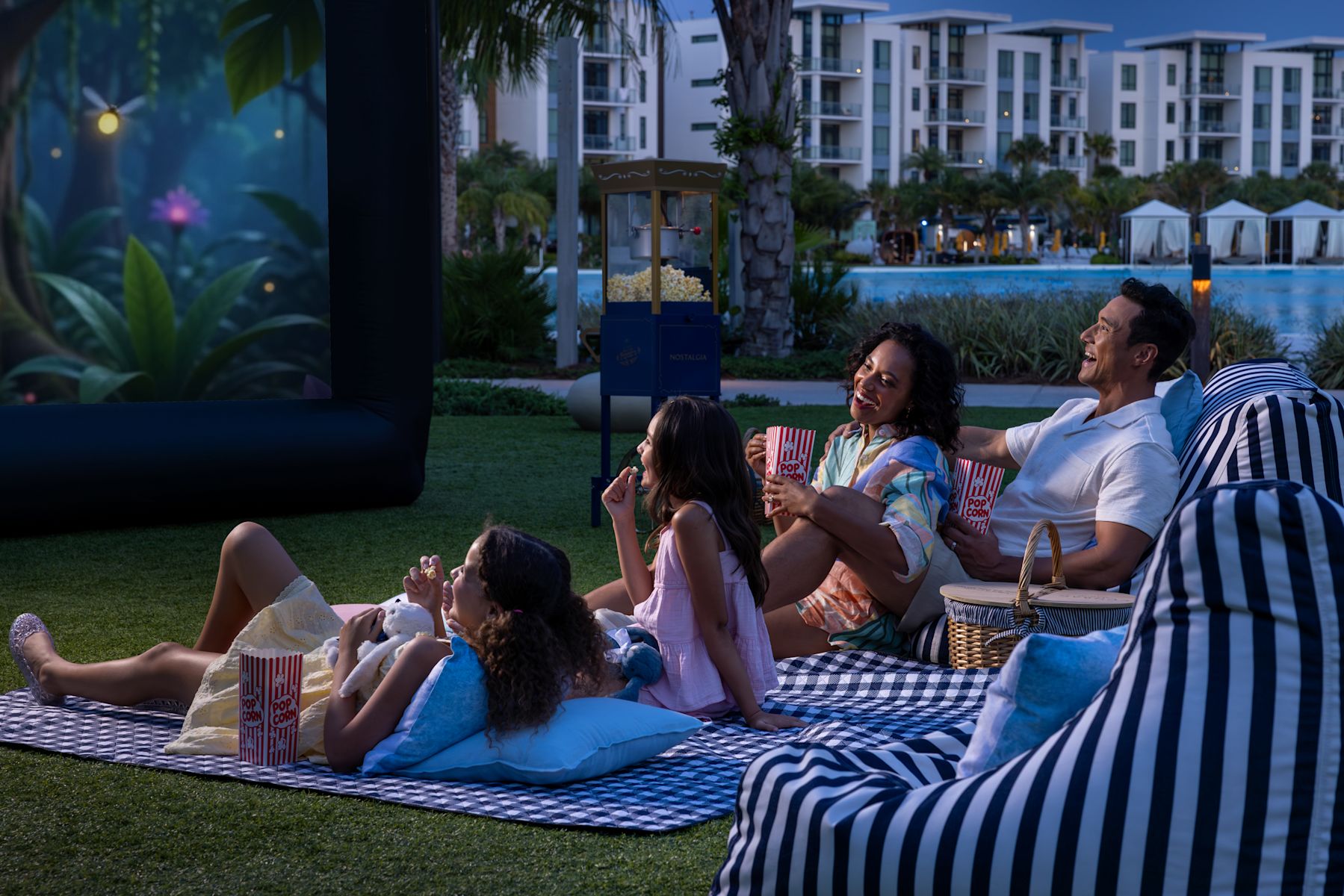 Family Enjoying Movies on the Lawn