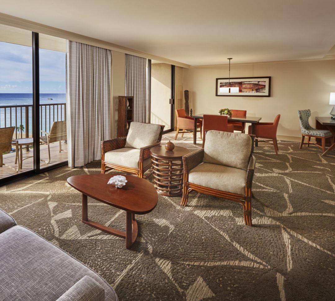 suite living area with balcony-transition