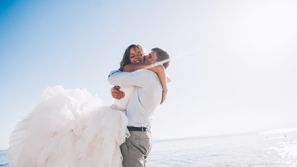 bride and groom embracing