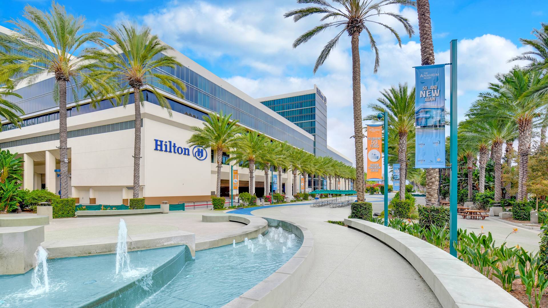 Hotel Exterior and Grand Plaza with small water fountains