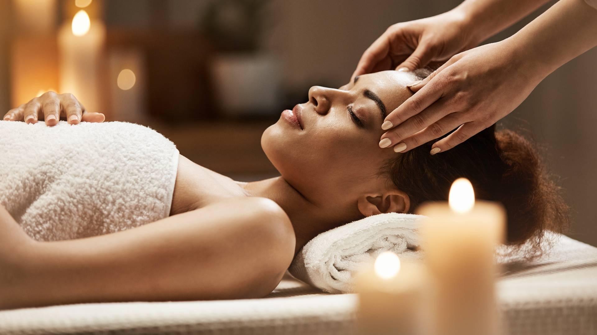 Person receiving head massage