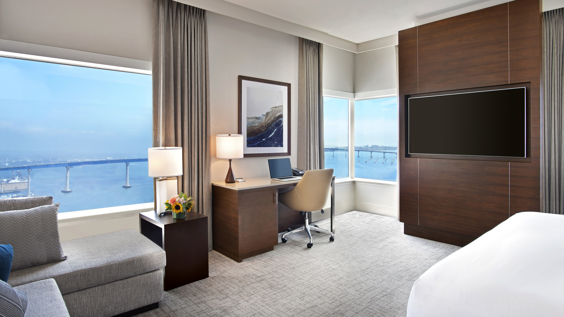 King Bed guest room, TV, work desk, window views