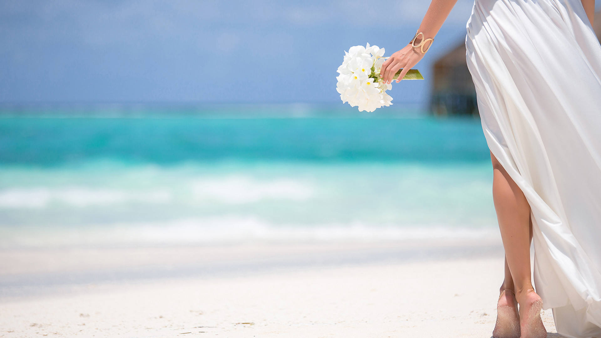 Closeup of bride on beach