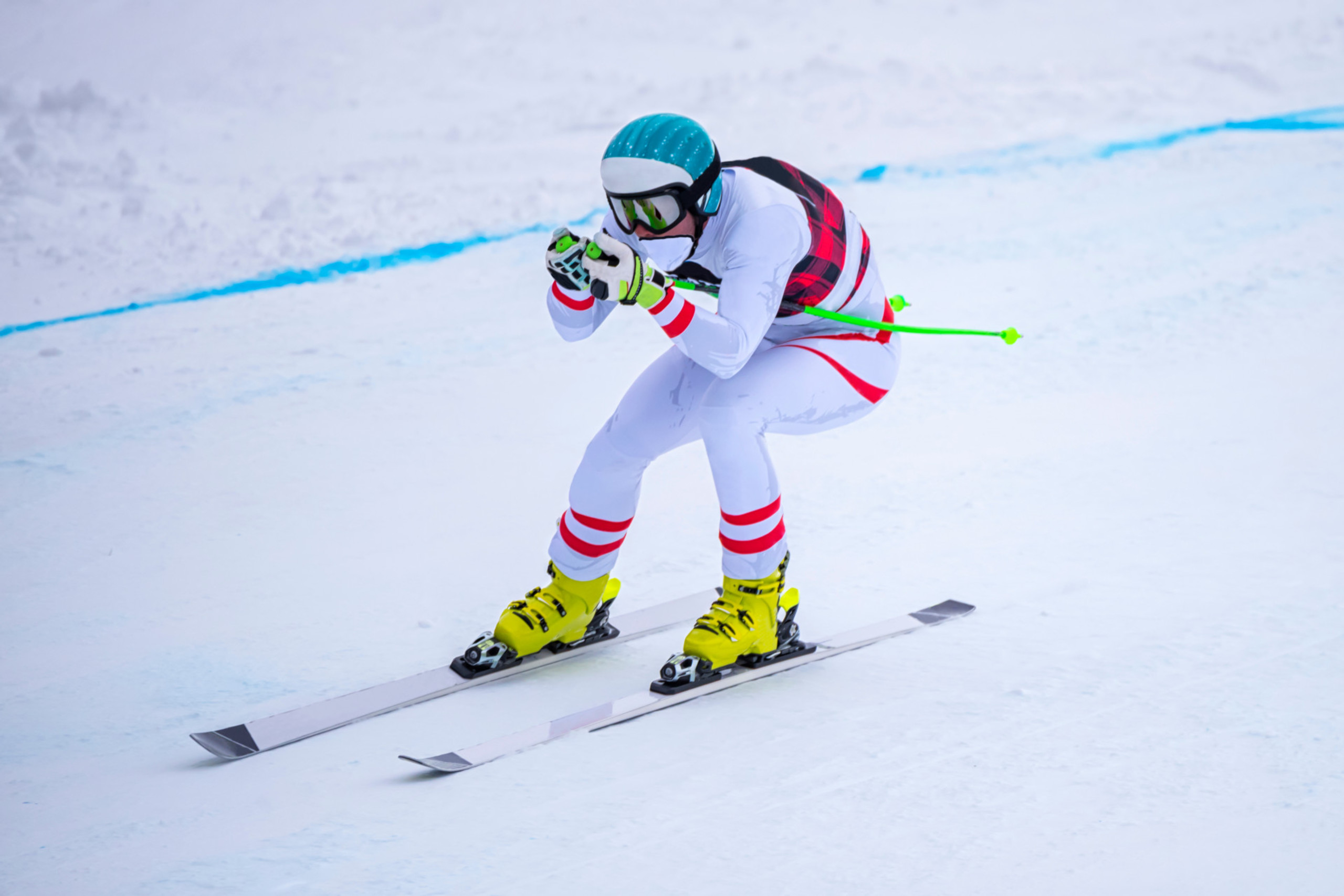 Person doing downhill skiing
