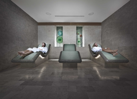Couple on Spa Repose chairs
