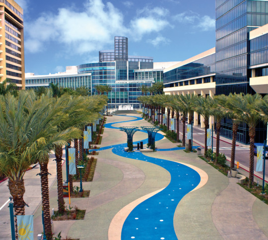 Tree lined plaza leading down to the Convention Center
