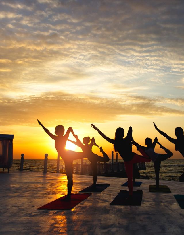 Sunset yoga class on the beach