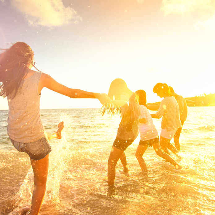 Teenagers enjoying the beach