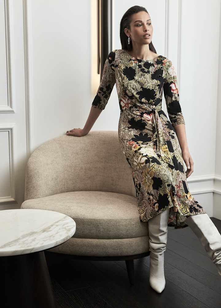 Woman modeling luxury fashions