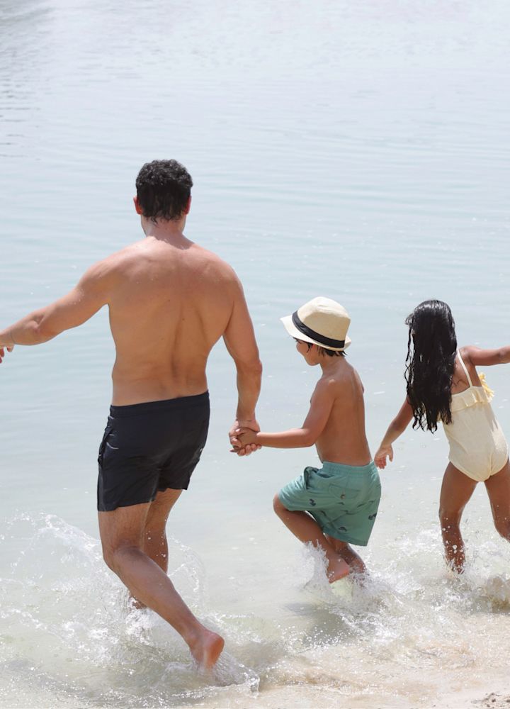 Family Enjoying a Day at the Beach