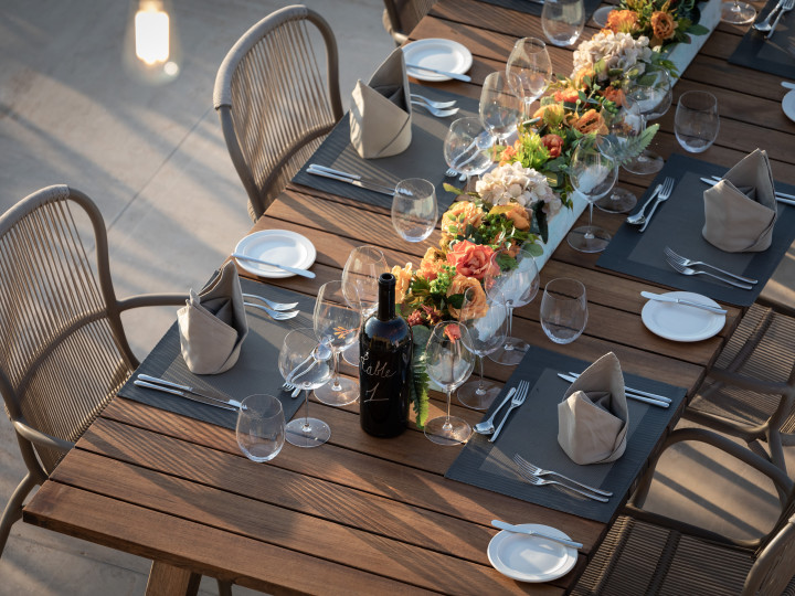 Dining table set up for an outdoor meal