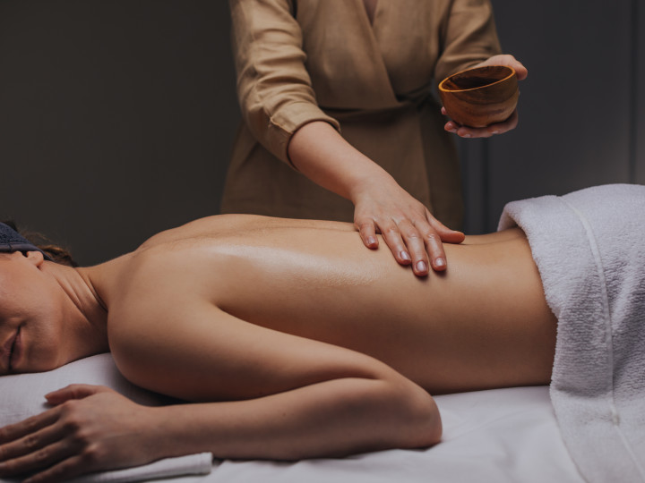 Person receiving massage treatment