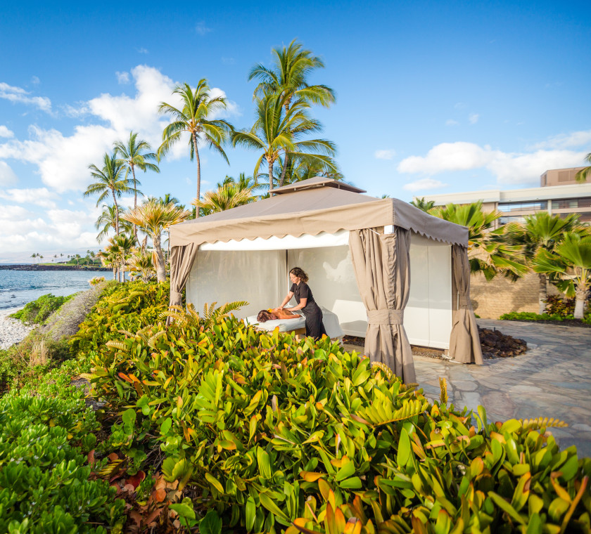 Outdoor massage with ocean views.