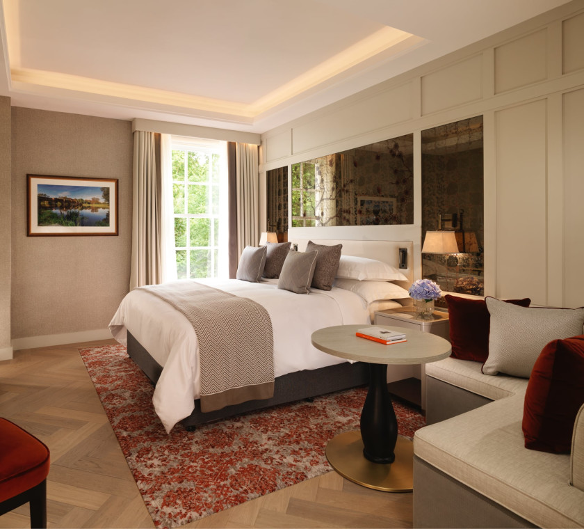 Guest room with king size bed and modern décor.
