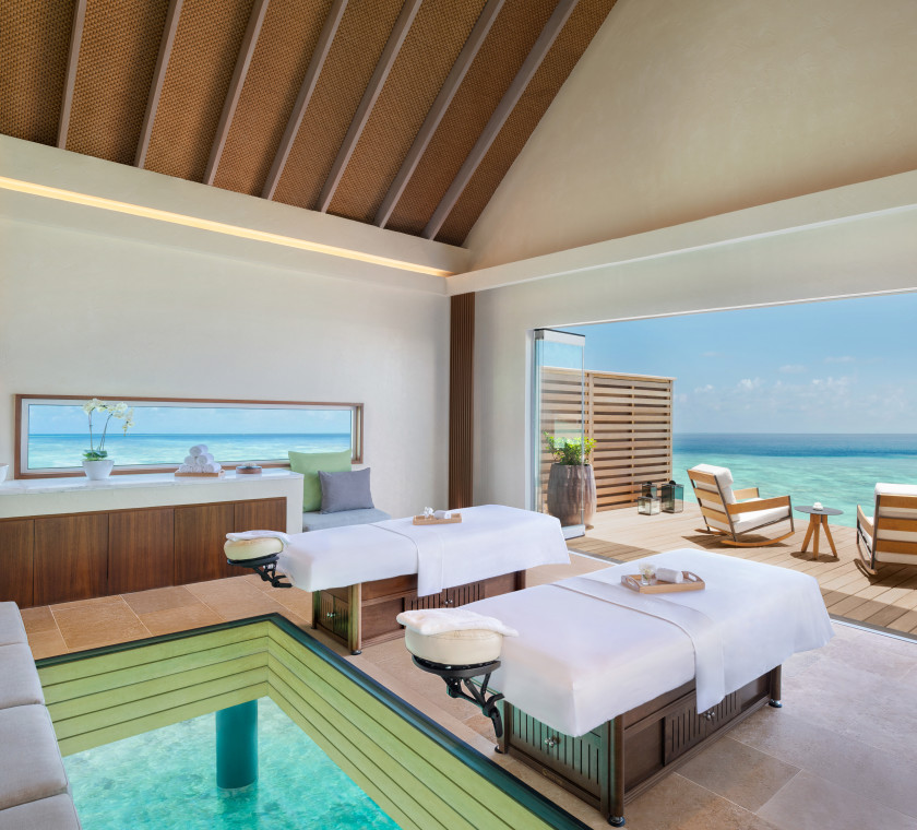 Two spa treatment tables in the Overwater Treatment Villa