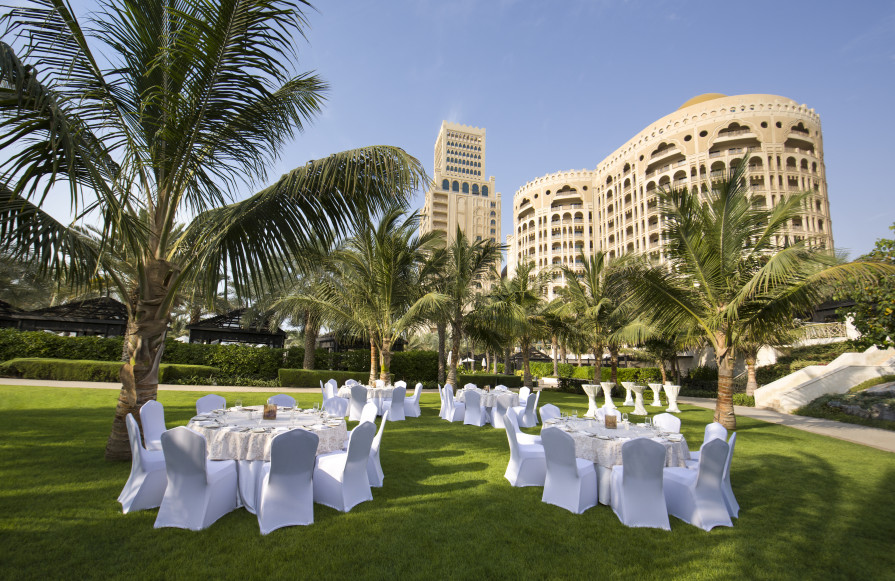 Wedding reception on lawn in front of hotel