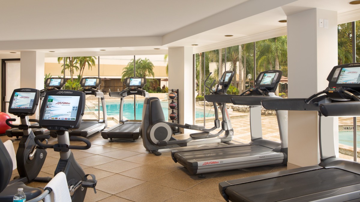 Treadmills and recumbent bicycles in a fitness center